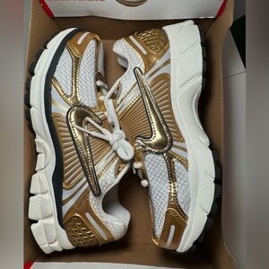Nike Gold and White Nike Vomero Women's Athletic Shoes